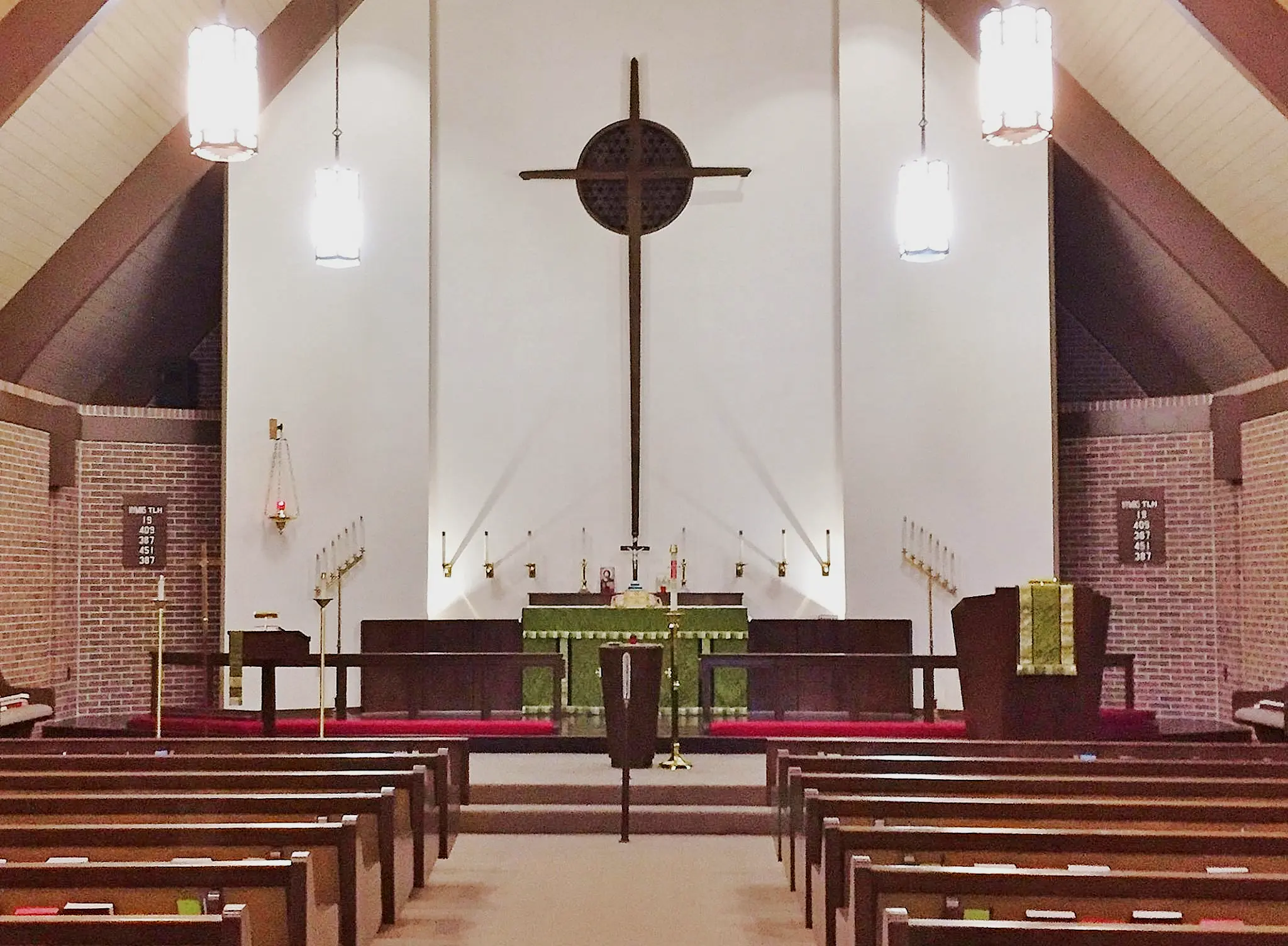 The altar and cross in Redeemer’s sanctuary, where the congregation gathers around Christ’s gifts